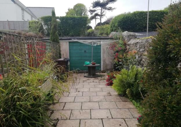 Studio, in Garage and Forecourt, £15,000