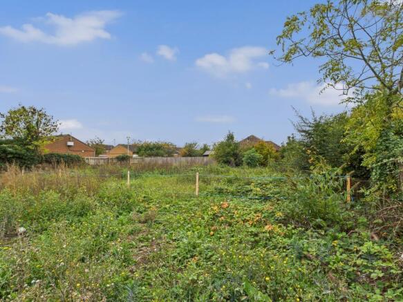 Land, in 114 High Street, £145,000