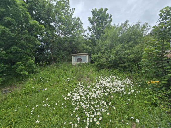Land, in Old Carriage House, £50,000