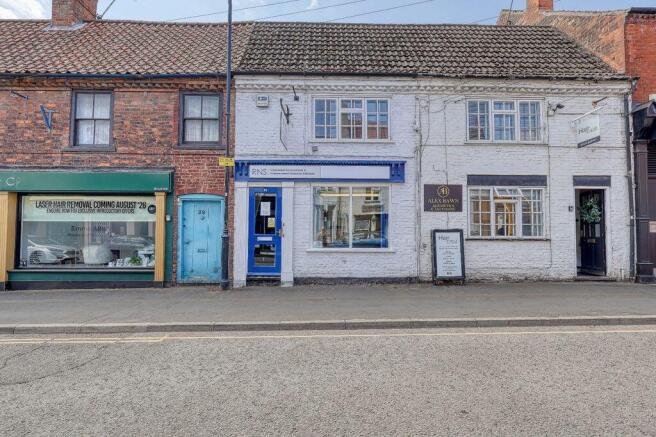 Land, in High Street, £95,000