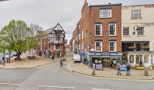 Land, in 52 Bridge Street And 2 White Friars, £950,000
