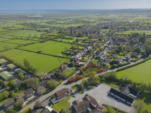 Land, in Woolavington Road, £250,000