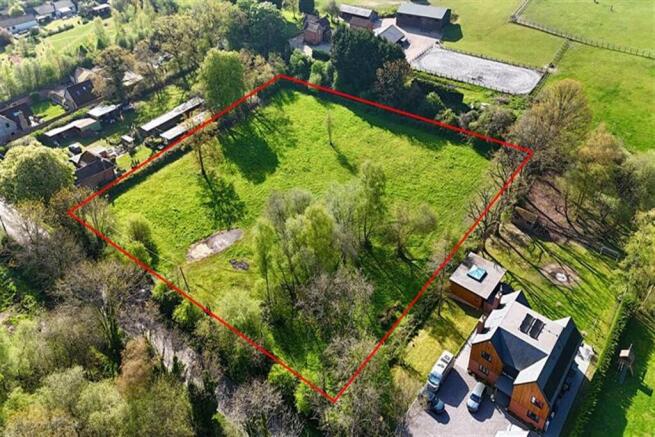 Land, in Headley, £850,000