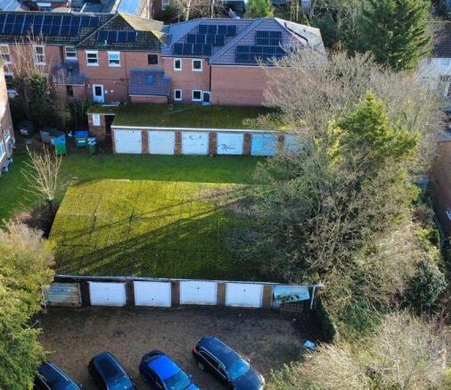 Land, in 14 Lock-up Garages Robere House, £70,000