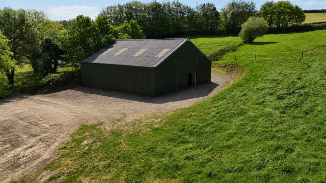 Land, in Atherington, £350,000