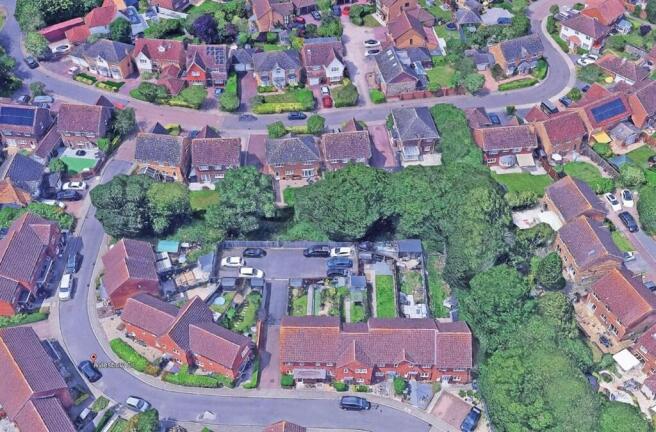 Land, in Aylesbury Drive, £10,000