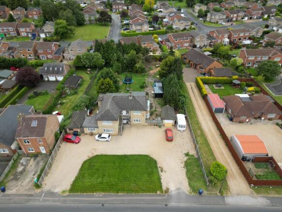 Land, in Leverington Road, £400,000