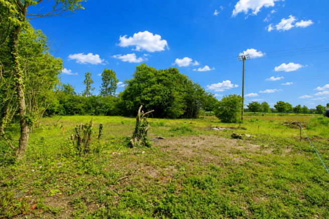Land, in White Roding, £600,000