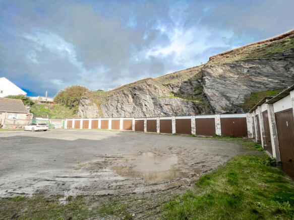 Land, in Garages At, £300,000