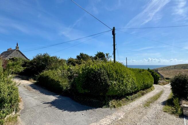 Land, in Winspit Road, £400,000