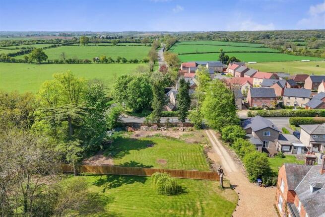 Land, in High Street, £245,000