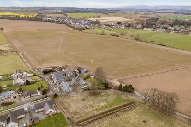 Land, in Woodside, £75,000