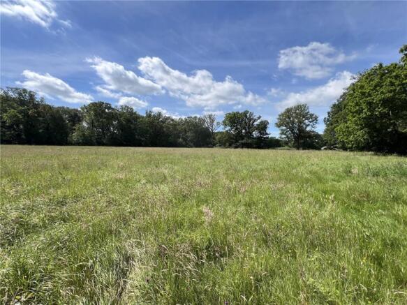 Land, in Woodside Road, £200,000