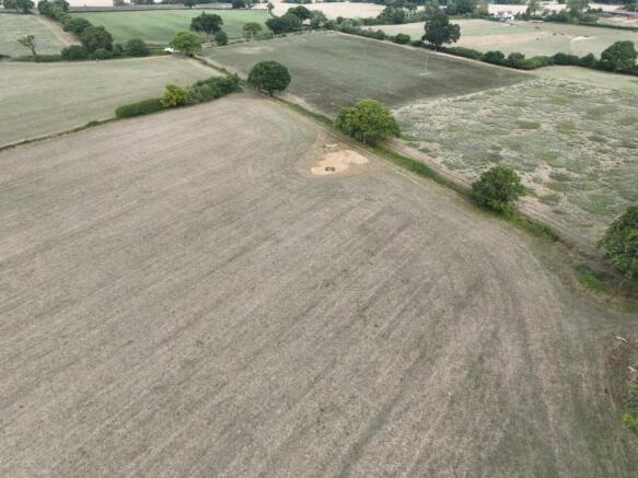 Land, in CM77, £6,000
