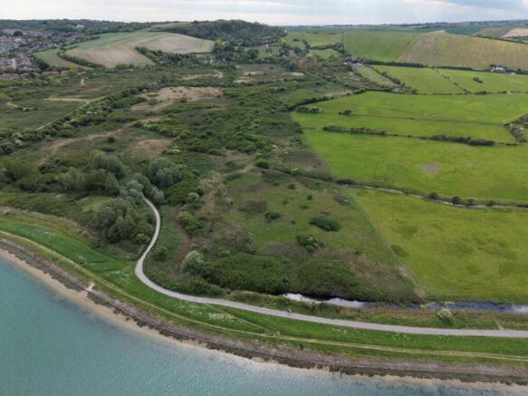 Land, in Lewes Road, £300,000