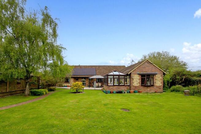 5 bed property, in Woodcote Lane, £775,000