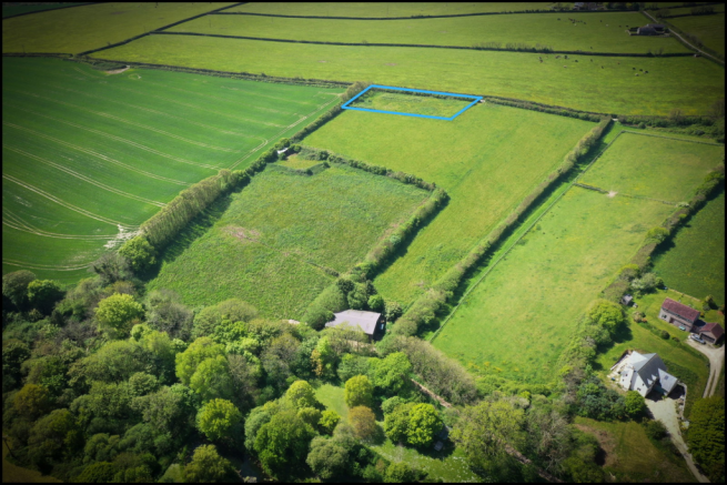 Land, in Kingston, £25,000