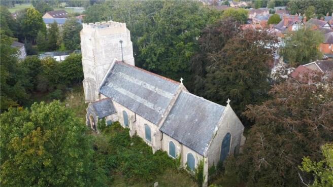 Land, in Bury Road, £300,000