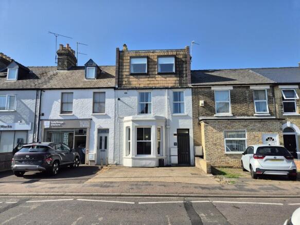Land, in 99 Victoria Road, £700,000