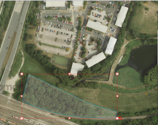 Land, in Land to the rear of Lakeside Business Park, £15,000