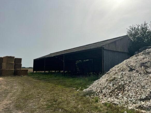Land, in Round House Farm, £280,000
