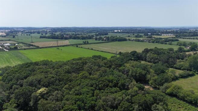 Land, in Woodland at Big Copse, £60,000