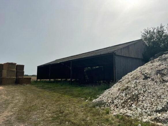 Land, in Round House Farm, £140,000