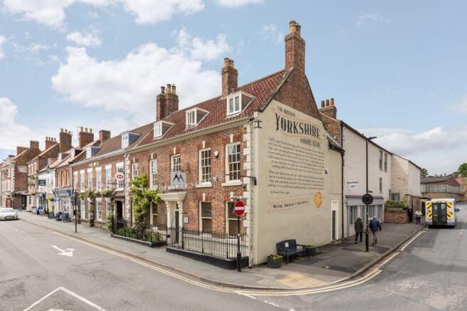 Land, in Market Place, £550,000