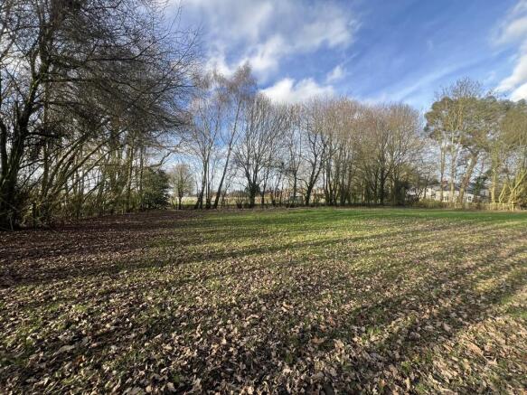 Land, in Bury Road, £200,000