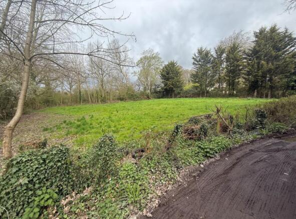 Land, in Land on the south side of, £140,000