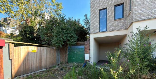 Land, in Powys Lane, £50,000