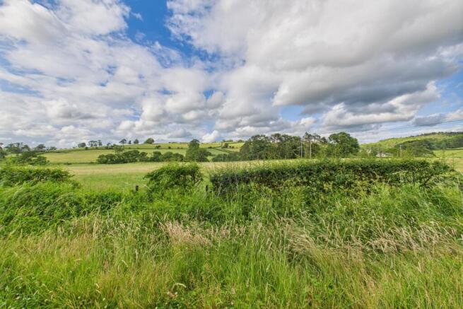 Land, in West Chirnells, £300,000