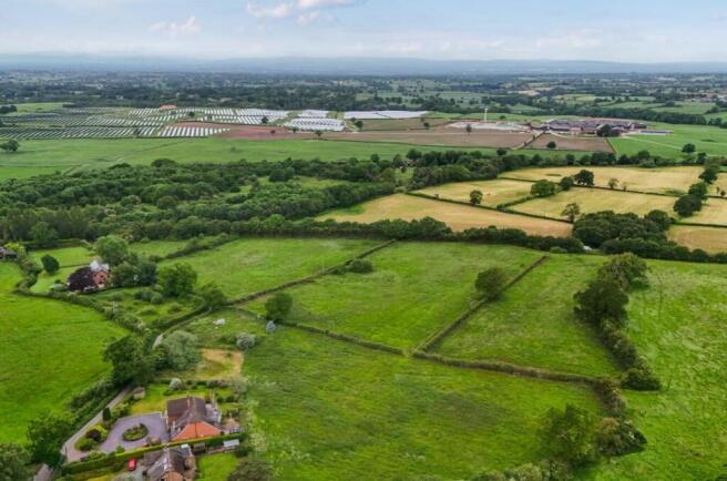 Land, in Land at Pear Tree Lane, £25,000