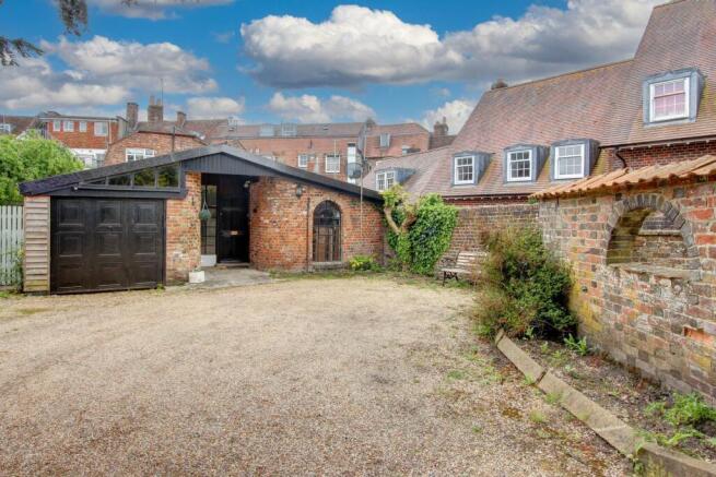 Land, in West Street, £300,000