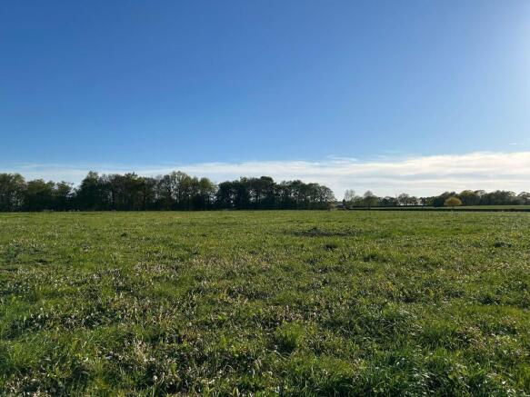 Land, in Davenport Lane, £250,000