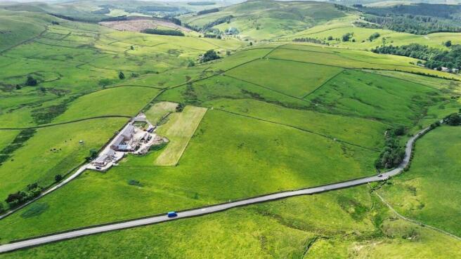 Land, in Lot 5: Brookhouse Farm, £50,000