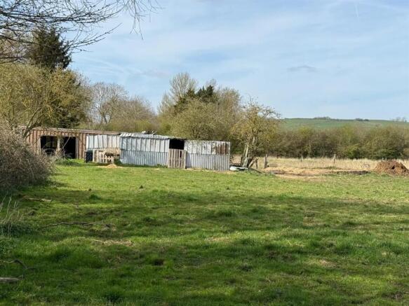 Land, in Ashley Road, £100,000