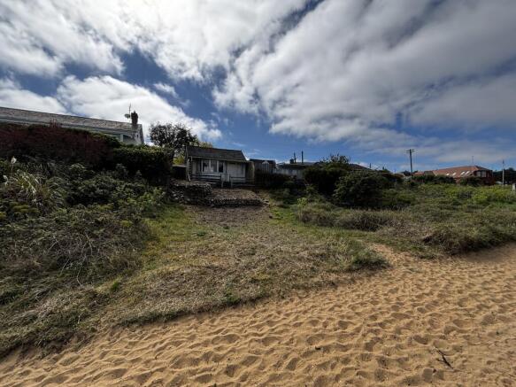 Land, in Beach Hut, £125,000