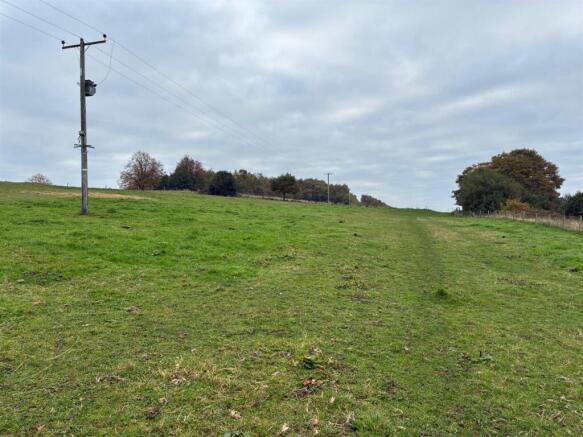 Land, in Greenfield Close, £80,000