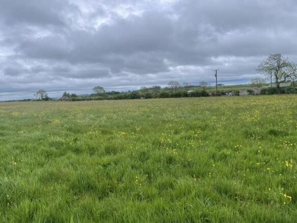 Land, in Wham Road, £100,000