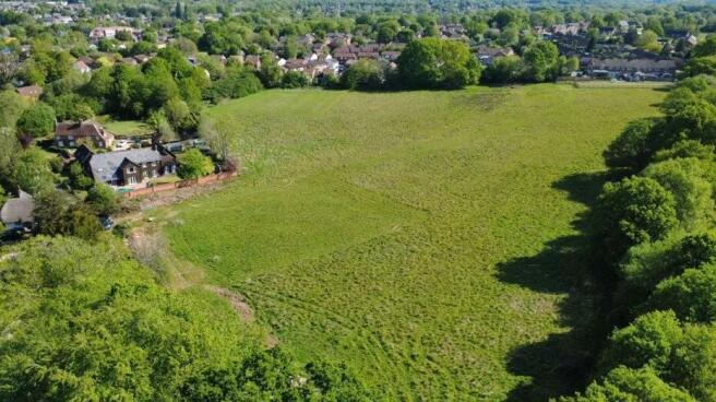 Land, in Plots 6, £100,000