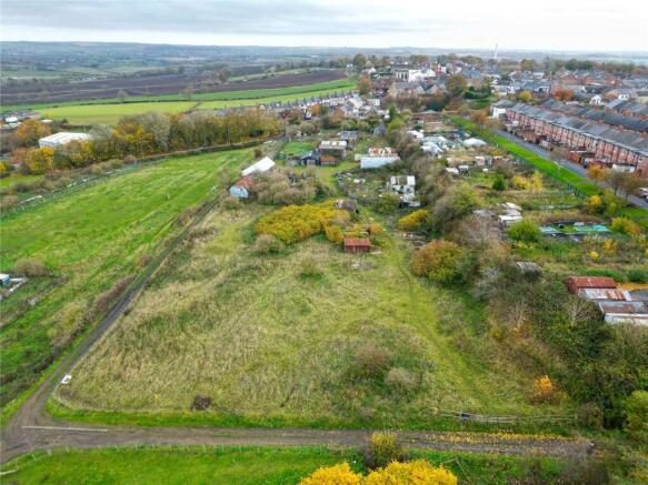 Land, in Land On The West Side of West Street Bank, £395,000
