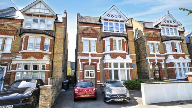 Land, in Flat 2, £70,000