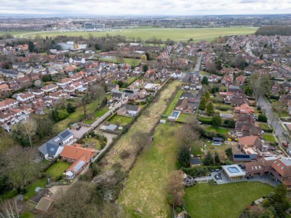 Land, in Tadcaster Road, £500,000