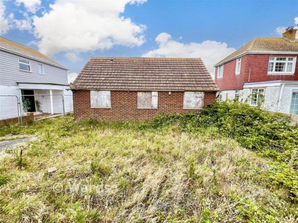 Land, in Merritt Road, £200,000
