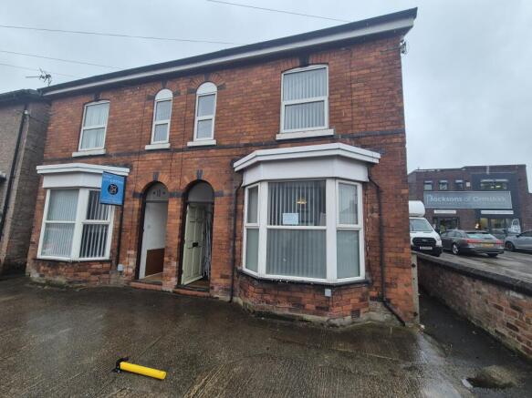 Land, in 8 Wigan Road, £200,000