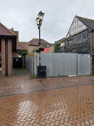 Land, in High Street, £500,000