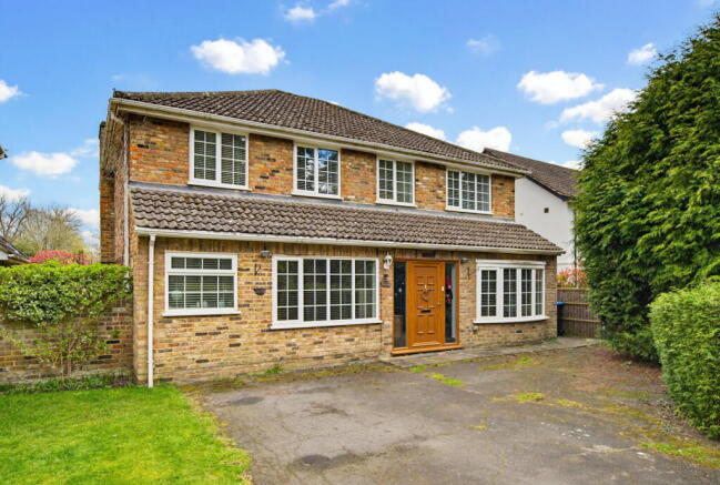 6 bed property, in Woodham Lane, £1,100,000