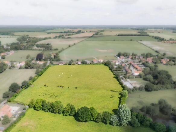 Land, in Billingford, £300,000
