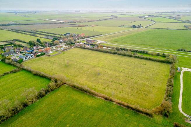 Land, in Main Road, £400,000